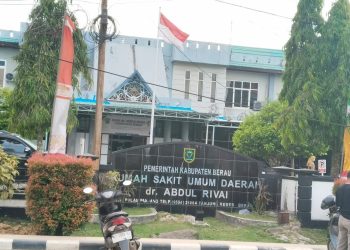 Diduga Tabrak Undang-undang untuk Muluskan Kenaikan Tarif Restribusi RSUD dr. Abdul Rivai, Benarkah..?   Ini Faktanya….! 👇👇👇