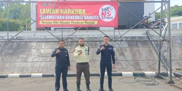 Bidhumas Polda Kaltim Pasang Spanduk Himbauan Kamtibmas di Balikpapan Selatan