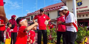 Polres Bontang Meriahkan HUT RI ke-80 dengan Senam dan Lomba Tradisional
