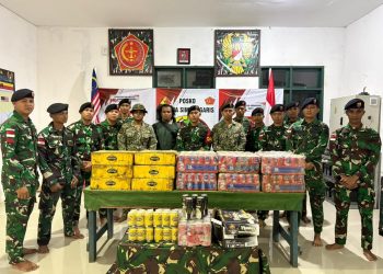 Satgas Pamtas RI-Malaysia Yonkav 13/Satya Lembuswana Gagalkan Upaya Penyelundupan Miras Ilegal di Perbatasan